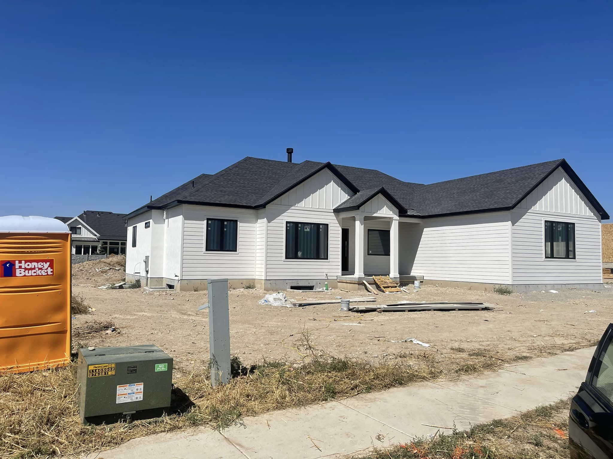 White siding installation on a new build home
